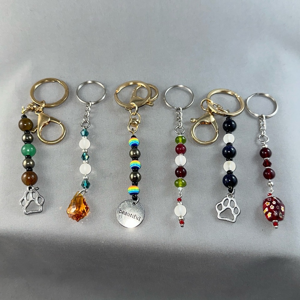 Handmade Keyrings with gemstones, paw charmed and more.